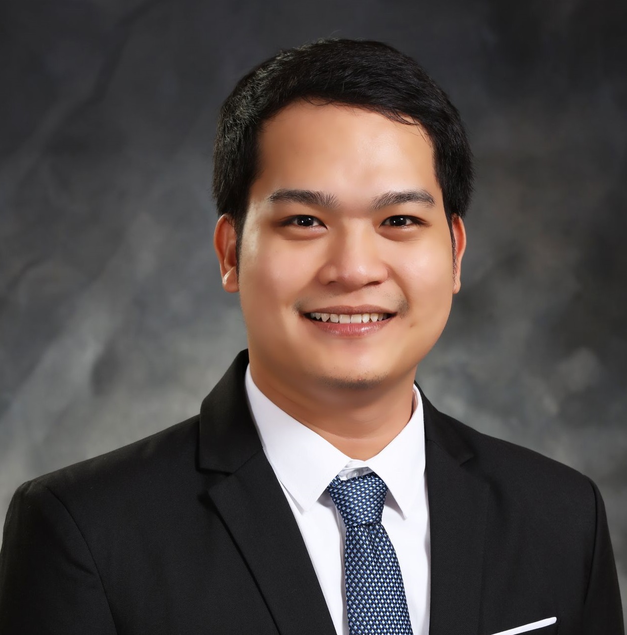 Mr. Andie Rafael E. Quiballo